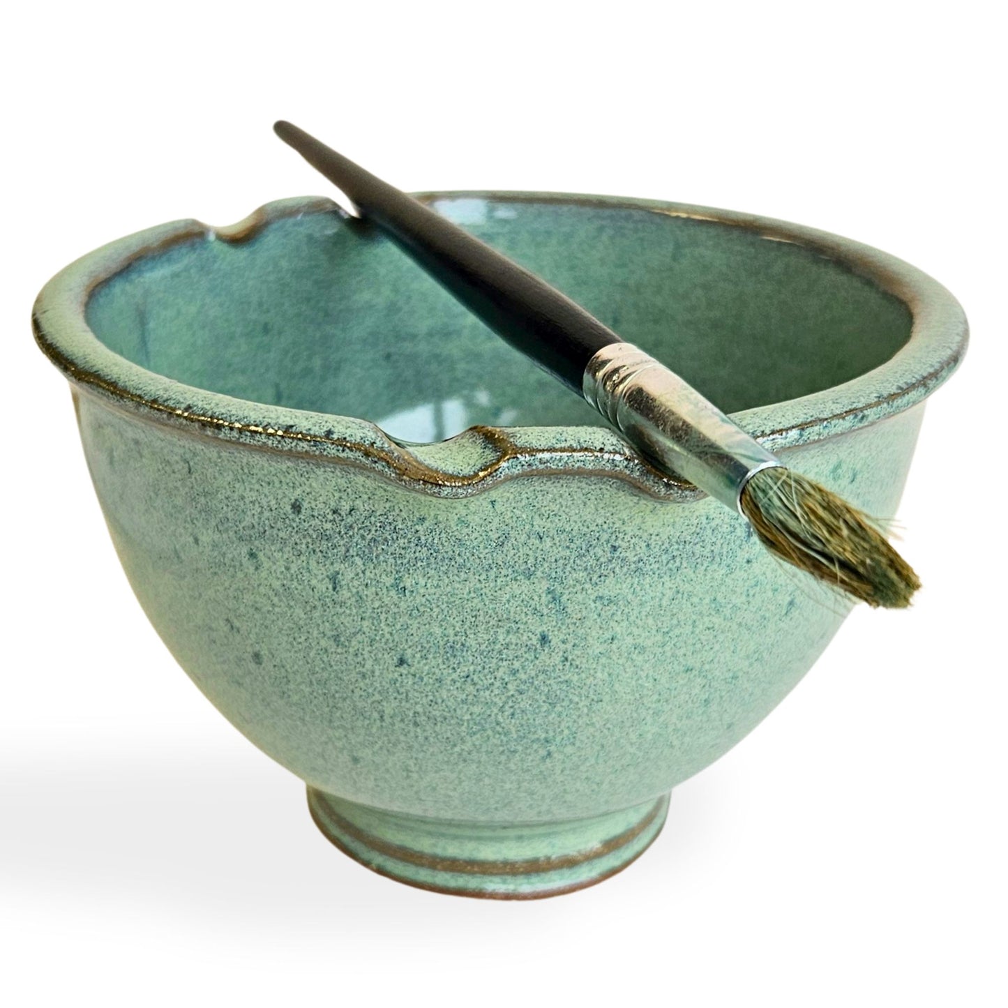 Handmade stoneware brush rinse bowl with two offset brush rests on the rim and swirl design on the bottom for cleaner brushes. Dishwasher-safe ceramic bowl designed by artists for artists.