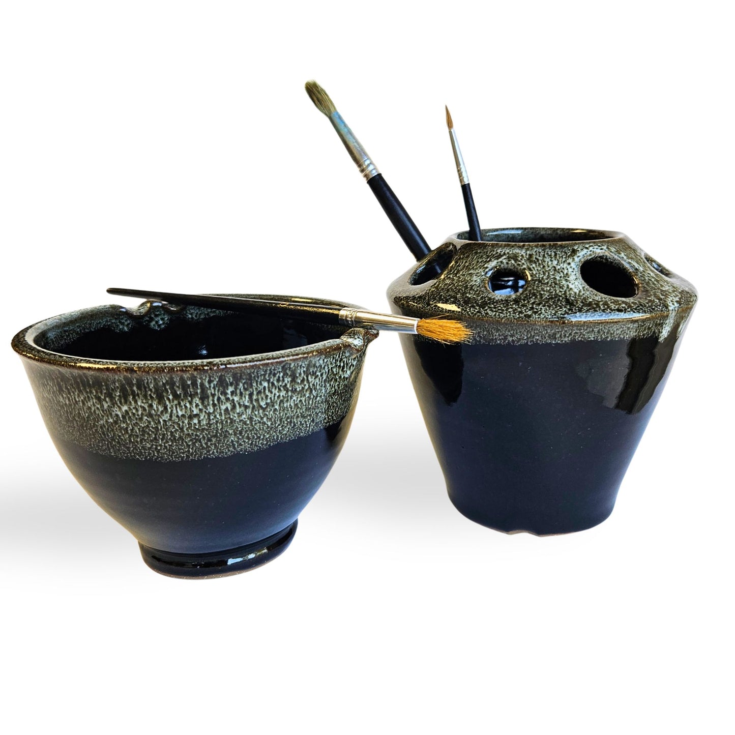 Unique handmade ceramic artist gift set featuring a watercolor rinse bowl and coordinating brush caddy organizer. Includes multiple tool slots and brush rests, crafted from durable stoneware clay. A beautiful and functional pottery set for creatives, crafters, and painters.