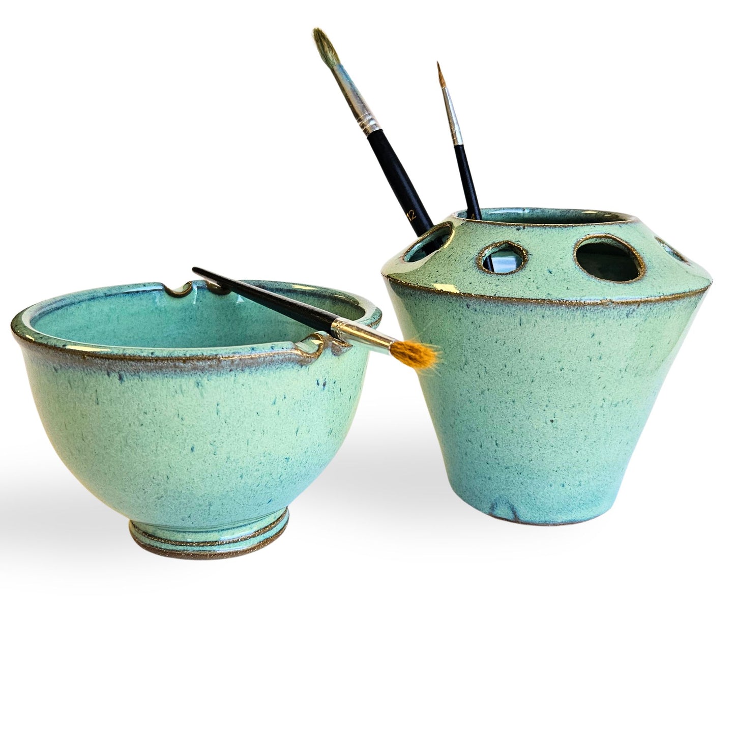 Handmade ceramic watercolor painting set with matching blue brush rinse bowl and coordinating pottery tool caddy. Features built-in brush rests, multiple tool slots for pens, pencils, or paintbrushes, and durable dishwasher-safe stoneware. Perfect for artists, painters, and crafters.