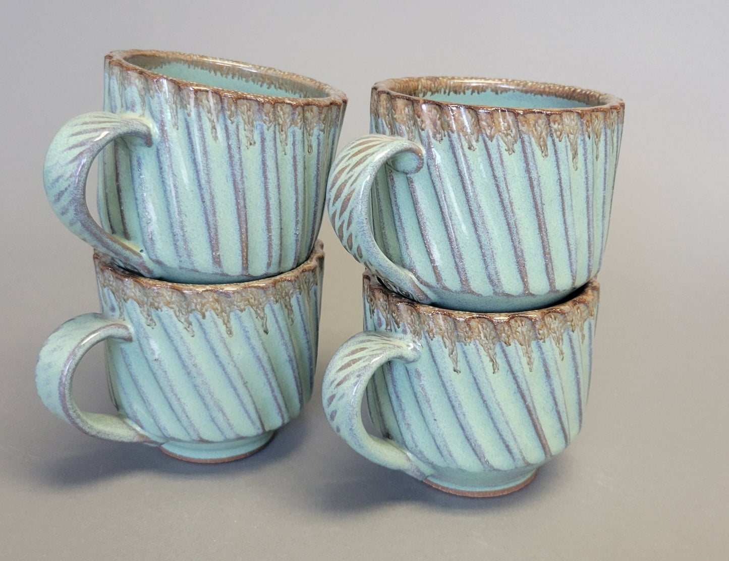 Set of 4 Diagonal Stripe Faceted Coffee Mugs in Green Bronze Drip