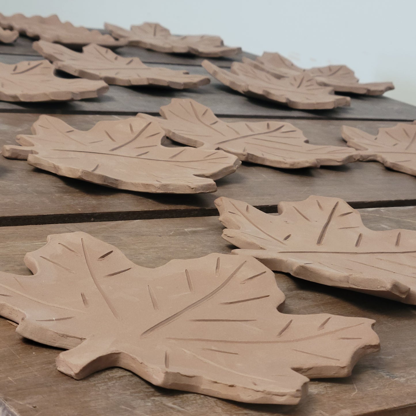 Making maple leaf spoon rests. The Mud Place Pottery, Melbourne, Florida
