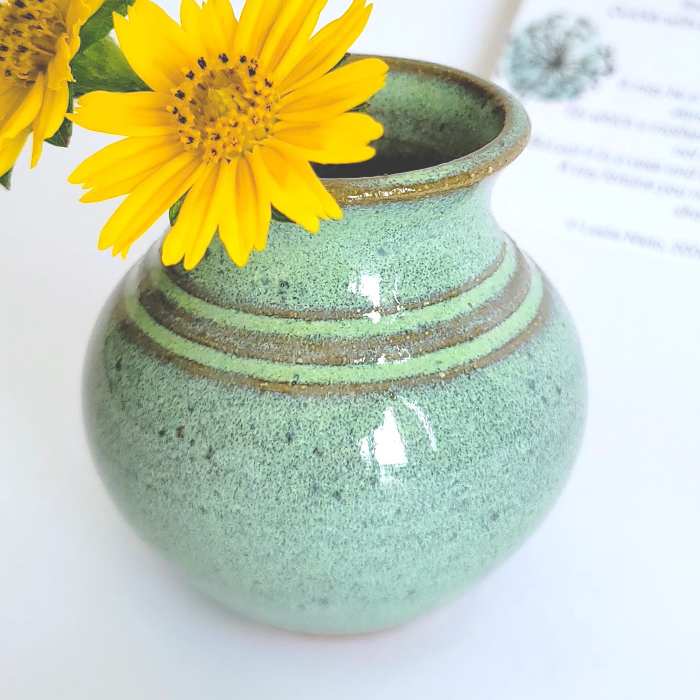 Handmade mini ceramic vase called Mommy Pot, approx. 1.5–2.5 inches tall. Tiny pottery bud vase with poem, perfect ready-to-gift keepsake for moms. Perfect for wildflowers.