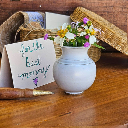 Handmade ceramic Mommy Pot in farmhouse white glaze, featuring a wildflower bouquet and "for the best mommy" card – a meaningful keepsake for Mother's Day, birthdays, or thinking-of-you gifts.