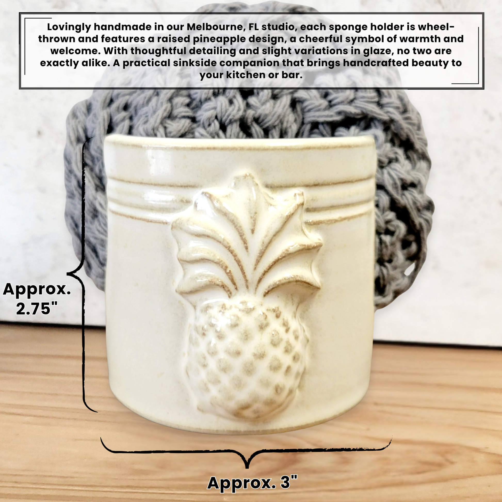 Dimensions for a handmade artisan yellow ceramic sponge holder with embossed pineapple, paired with a gray cotton crochet scrubber sponge. Eco-friendly kitchen countertop accessory perfect for storing crochet scrubbers, dish sponges, and sink cleaning essentials. 2.75 inches by 3 inches