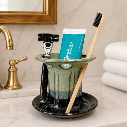 Bathroom counter organizer keeping toothbrushes, toothpaste and shaving razor neatly stored together