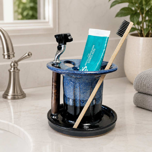 Modern bathroom vanity organizer for toothbrushes, toothpaste and shaving razor storage beside the sink