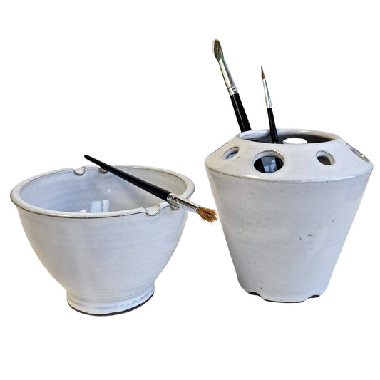 Handmade ceramic watercolor painting set includes matching brush rinse bowl and coordinating paintbrush and tool caddy. Features built-in brush rests, multiple tool slots. Perfect for artists, painters, and crafters.